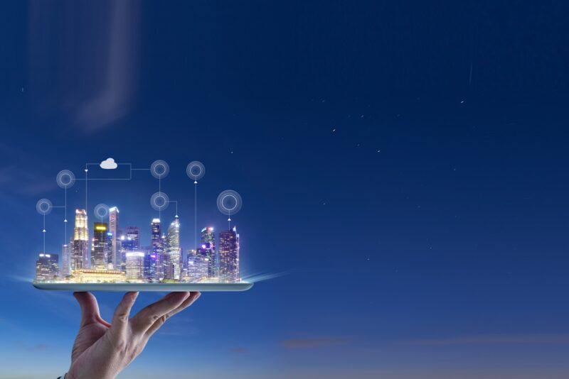 Waiter hand holding an digital tablet with Smart city with smart
